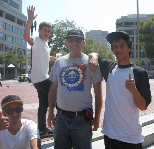 Larry with skate-boarders he was witnessing to at UN Plaza