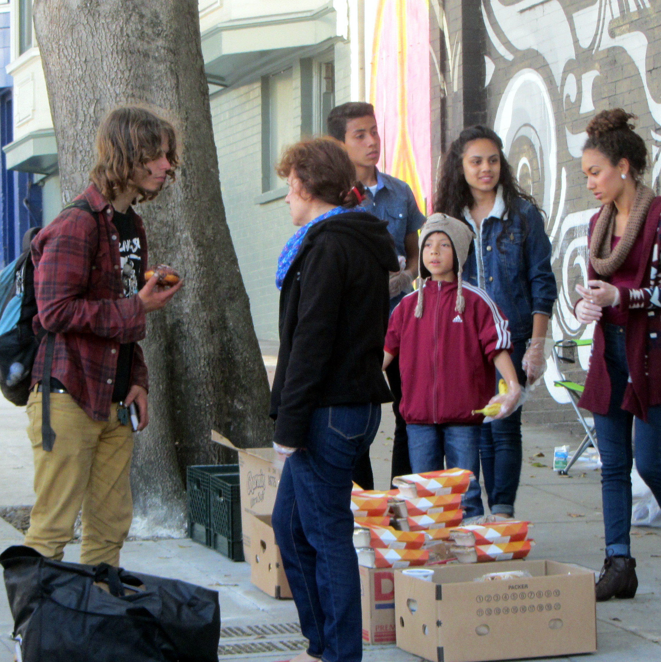 CASTILLO FAMILY WITNESSES AND GIVES OUT FOOD ON HAIGHT ST.